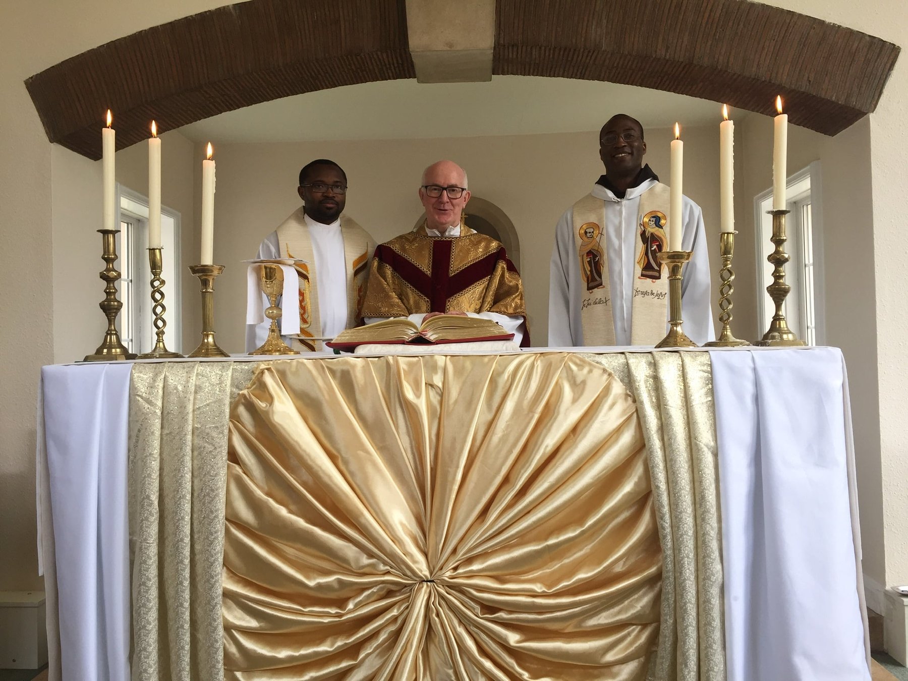 CACS community gathered in prayer at the Carmelite Priory altar